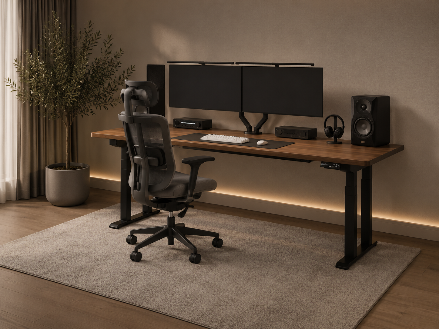 Axis Monolith 4-leg height-adjustable desk holding dual monitors and studio audio gear
